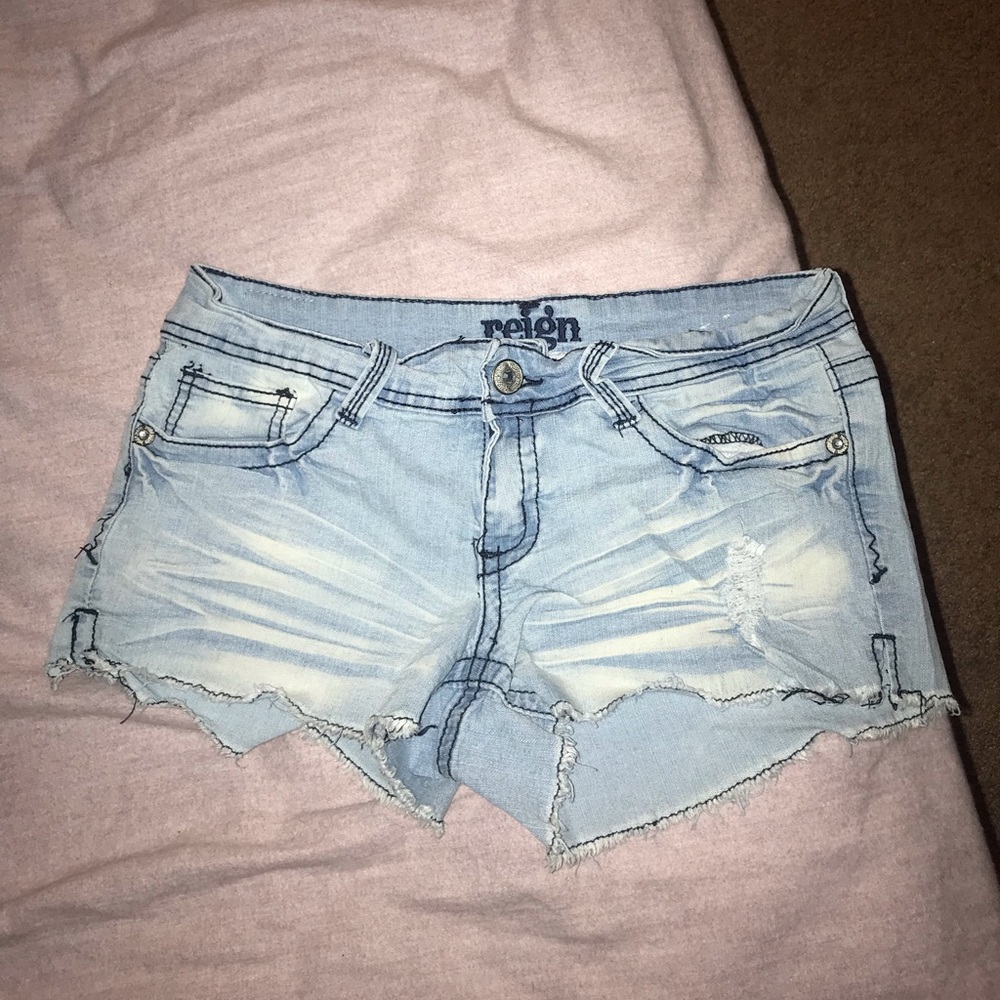 Light blue ripped jean shorts
